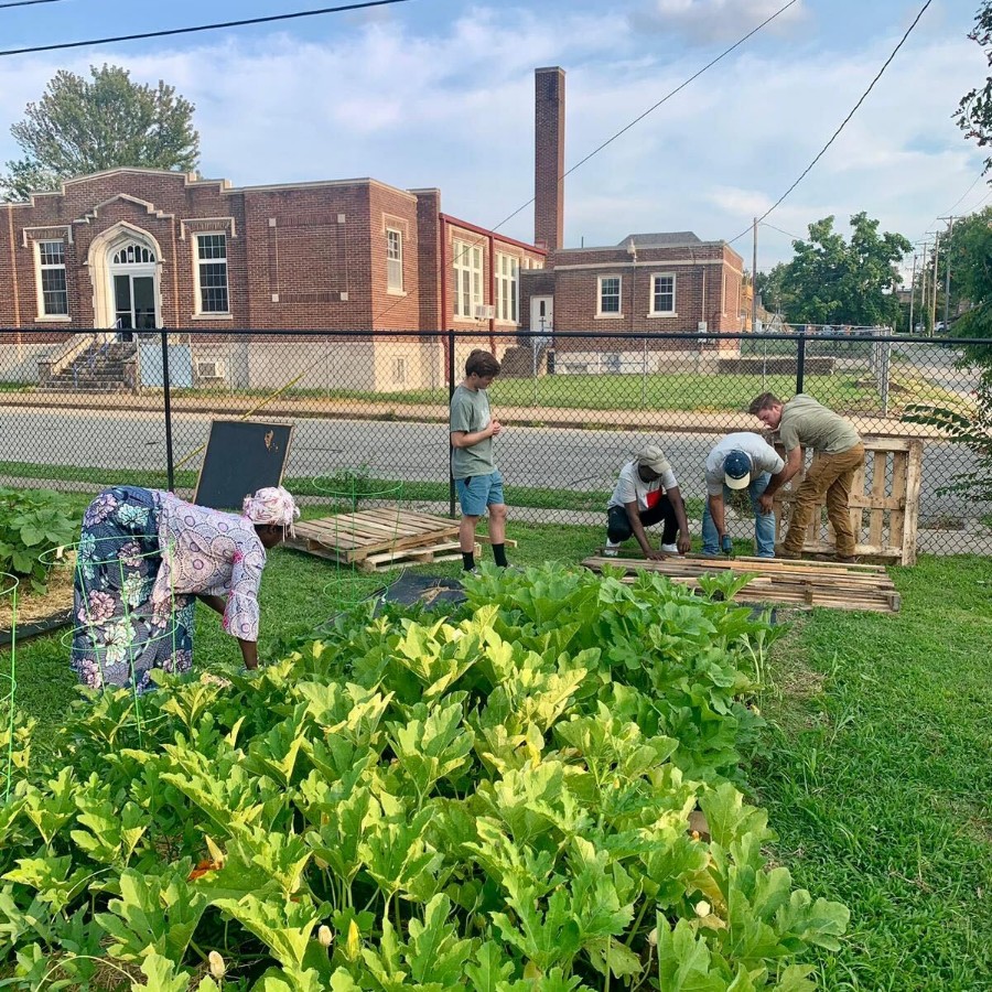 people working on the community garden